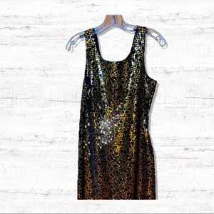 Sequin sheath dress. Black and gold